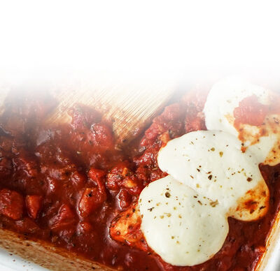 Ricetta Protinella Pollo gratinato con pomodori ed erbe aromatiche in un piatto con Protinella di GOLDSTEIG