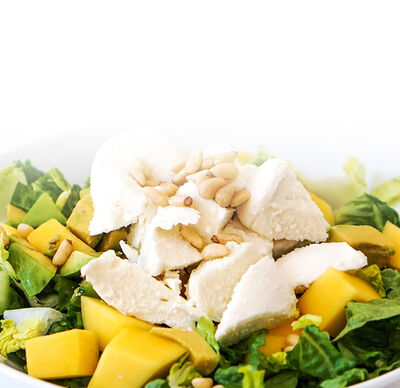 Ricetta Protinella Insalata di mango con rucola e pinoli di GOLDSTEIG in a bowl
